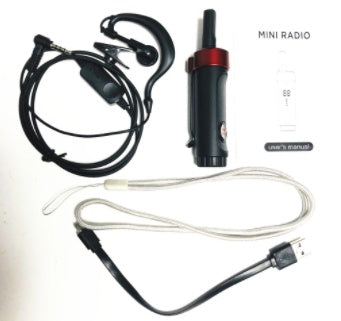 A mini walkie-talkie that fits perfectly in a shoulder pocket bag.