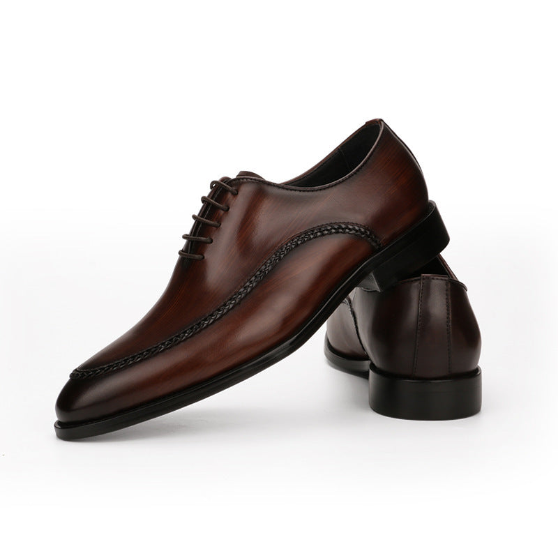 Men's leather shoes with a cowhide upper and low-top design.