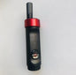 A mini walkie-talkie that fits perfectly in a shoulder pocket bag.