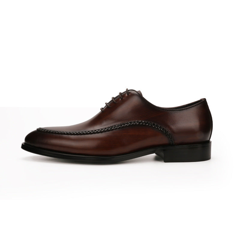 Men's leather shoes with a cowhide upper and low-top design.