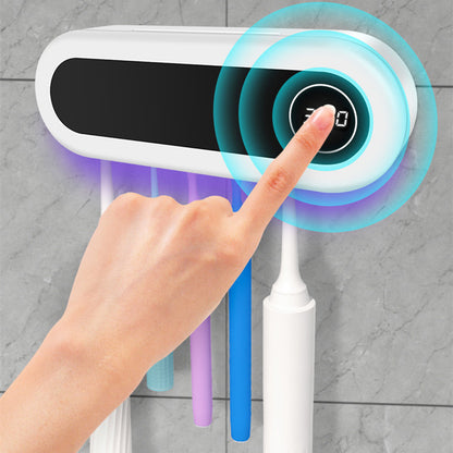 Wall-mounted toothbrush holder with a smart UV sterilizer, toothpaste dispenser, and squeezer, perfect for bathroom accessories.