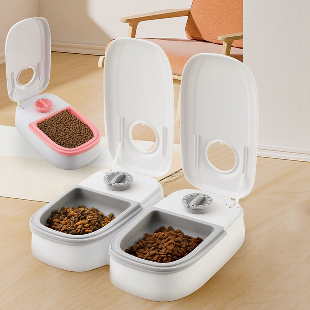 Automatic pet feeder with a smart food dispenser for cats and dogs, featuring a timer, stainless steel bowl, and automatic feeding system. Perfect for pet feeding and supplies.