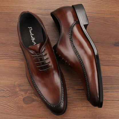 Men's leather shoes with a cowhide upper and low-top design.