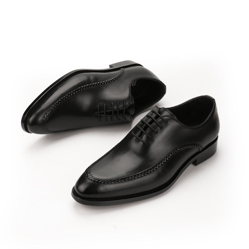 Men's leather shoes with a cowhide upper and low-top design.