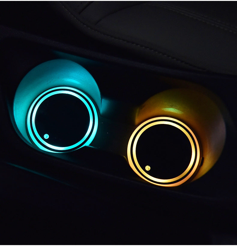 Colorful LED car cup holder coaster with USB charging, non-slip design, and automatic ambient lighting for cars.