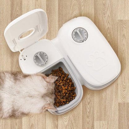Automatic pet feeder with a smart food dispenser for cats and dogs, featuring a timer, stainless steel bowl, and automatic feeding system. Perfect for pet feeding and supplies.