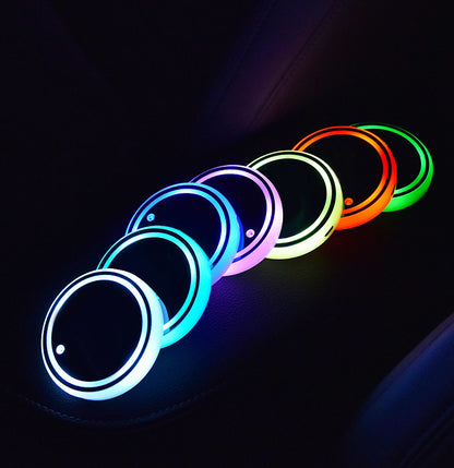 Colorful LED car cup holder coaster with USB charging, non-slip design, and automatic ambient lighting for cars.